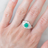 Anello a margherita vintage in platino con smeraldo colombiano (1.07ct) e diamanti (1.01ctw), anni ‘80