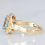 Anello vintage in oro giallo 14K con topazio azzurro (2.80ct ca.) e diamanti di taglio brillante (0.16ctw ca.), anni ‘80/‘90