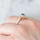 Anello a margherita vintage in oro giallo 9K con zaffiro (0.45ct ca.) e diamanti (0.10ctw ca.), anni ‘80