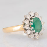 Anello a margherita vintage in oro giallo e bianco 14K con smeraldo (1.75ct ca.) e diamanti di taglio brillante (0.72ctw ca.), anni ‘70