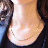 Collana vintage in oro giallo 8K con maglia omega
