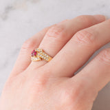 Anello a margherita vintage in oro giallo 18K con rubino (0.51ct) e diamanti (0.41ctw), anni ‘80/‘90