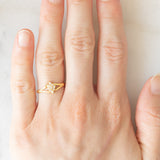 Anello a fiore vintage in oro giallo 14K con diamanti di taglio brillante (0.09ctw ca.), anni ‘60/‘70
