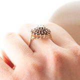 Anello a margherita vintage in oro giallo 9K con granati, anni ‘70