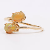 Anello vintage "bypass" in oro 9k e opali, 1989