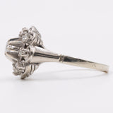 Anello vintage in oro bianco 18k con diamanti (0,28). Anni '60