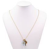 Collana vintage con simboli religiosi in oro giallo 18k e paste di vetro