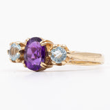 Anello vintage in oro giallo 9K con ametista e topazi azzurri