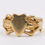 Anello vintage in oro giallo 18k raffigurante due sirene e uno stemma, anni '60