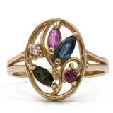 Anello vintage in oro 8k con rubini, zaffiri e diamante.