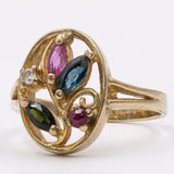 Anello vintage in oro 8k con rubini, zaffiri e diamante.