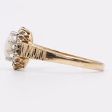 Anello in oro giallo 9K con opale (0.30ct ca.) e diamanti