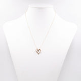 Catenina vintage con ciondolo a cuore in oro giallo 9k