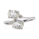 Anello vintage bypass in oro bianco 9k con hiddeniti e diamanti