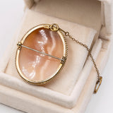 Spilla con cammeo su conchiglia raffigurante "Leda e il cigno" montata in oro 9k, primi del '900