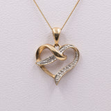 Collana vintage con ciondolo a cuore in oro giallo 9k e diamanti