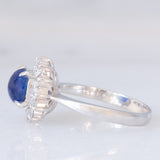 Anello a margherita vintage in platino con zaffiro (1.20ct) e diamanti (0.40ctw), anni ‘70/‘80