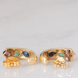 Orecchini vintage in oro giallo 14K con diamanti (0.01ctw ca.), rubini (0.15ctw ca.), smeraldi (0.10ctw ca.) e zaffiri (0.36ctw ca.), anni ‘70