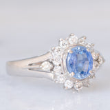 Anello margherita vintage in platino con zaffiro (0.75ct) e diamanti (0.31ctw), anni ‘80