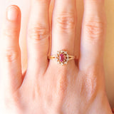 Anello a margherita vintage in oro giallo e bianco 14K con tormalina rosa (0.50ct ca.) e diamanti (0.08ctw ca.), anni ‘70