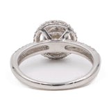 Anello vintage in platino 900 con diamante centrale di 0,59ct e diamanti di contorno (0,35ctw)