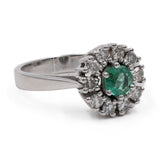 Anello vintage a margherita in oro bianco 14k con smeraldo (0,30ct) e diamanti (0,40ctw)