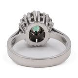 Anello vintage a margherita in oro bianco 14k con smeraldo (0,30ct) e diamanti (0,40ctw)