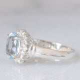 Anello a margherita vintage in platino con acquamarina (1ct) e diamanti, anni ‘70