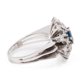 Anello vintage a margherita in oro bianco 14k con zaffiro (0,60ct) e diamanti (1ctw), anni '70