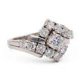 Anello vintage in oro bianco 14k con diamante centrale di 0,45ct e diamanti di contorno (1,20ctw), anni '70