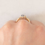 Anello a margherita vintage in oro giallo 9K con zaffiro (0.35ct ca.) e diamanti (0.14ctw ca.), anni ‘80