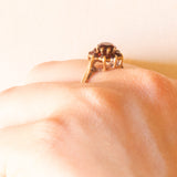 Anello a fiore vintage in oro giallo 9K con granati (0.75ctw ca.), anno 1997