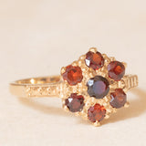 Anello a fiore vintage in oro giallo 9K con granati (0.60ctw ca.), anno 1966