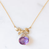 Collier vintage con catenina in oro giallo 18K e con ciondolo in oro giallo e bianco 14K con ametista (4.40ct ca.) e diamanti, anni ‘60/‘70