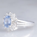 Anello a margherita vintage in platino con zaffiro (1.10ct) e diamanti (0.33ctw), anni ‘70