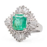 ANELLO A BALLERINA IN PLATINO 900 CON SMERALDO CENTRALE (1.80 CT) E DIAMANTI (1.05CT)