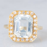 Anello a margherita vintage in oro giallo 14K con acquamarina (3.30ct ca.) e diamanti (0.22ctw ca.), anni ‘70