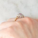 Anello a margherita vintage in oro giallo 9K con rubino (0.40ct ca.) e diamanti (0.28ctw ca.), anno 1987