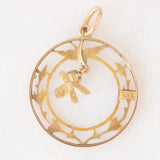 Ciondolo antico in oro giallo 9K con decorazioni naturalistiche e con rodine decorato da perline bianche e da ametista, anni ‘10/‘20