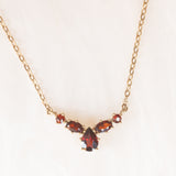 Collier vintage in oro giallo 8K con granati (1ctw ca.), anni ‘60/‘70