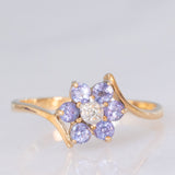 Anello contrarier con fiore in oro giallo 9K con tanzaniti (0.36ctw ca.) e diamante, anni ‘90