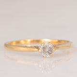 Solitario vintage in oro giallo 9K con diamante salt and pepper di taglio brillante (0.25ct ca.)