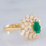 Anello ballerina vintage in oro giallo 14K con smeraldo (0.50ct ca.) e diamanti di taglio brillante e tapered (0.96ctw ca.), anni ‘80