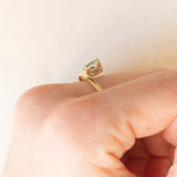 Anello in oro giallo e bianco 10K con smeraldo (0.50ct ca.) e topazi bianchi, anno 2016
