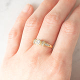 *RISERVATO* Anello “ballerina” in oro giallo 18K con diamanti di taglio brillante e di taglio tapered (0.71ctw ca.), anni ‘80