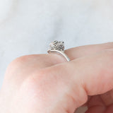 Anello Art Nouveau in oro bianco 18K con diamante di taglio vecchia miniera (0.10ct ca.), anni ‘20/‘30