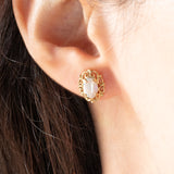 Orecchini vintage in oro giallo 9K con opali (0.70ctw ca.), anno 1981