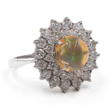 Anello vintage in platino 900 con opale di 1,97ct e diamanti per un totale di 1,08ct
