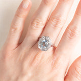 Anello a margherita francese vintage in platino e in oro bianco 18K con acquamarina (1.60ct ca.) e diamanti di taglio brillante (0.80ctw ca.), anni ‘70/‘80