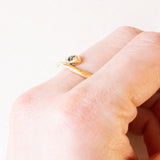 Anello vintage a forma di serpente in oro giallo 18K con zaffiro (0.20ct ca.) e diamanti, anni ‘60/‘70
